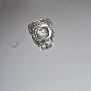 Elegant Silver-Toned Ring with Faceted Gemstone